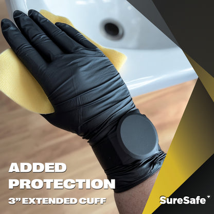 Black OBS Xtend glove covering a watch to demonstrate how the 3 inch extended cuff protects jewelry and skin.