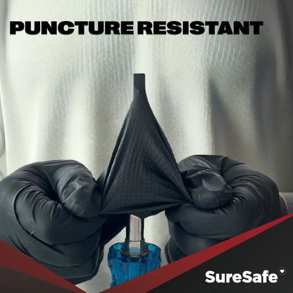 SureSafe IGRIP 8 mil black nitrile gloves being tested for high puncture resistance in demanding industrial environments.