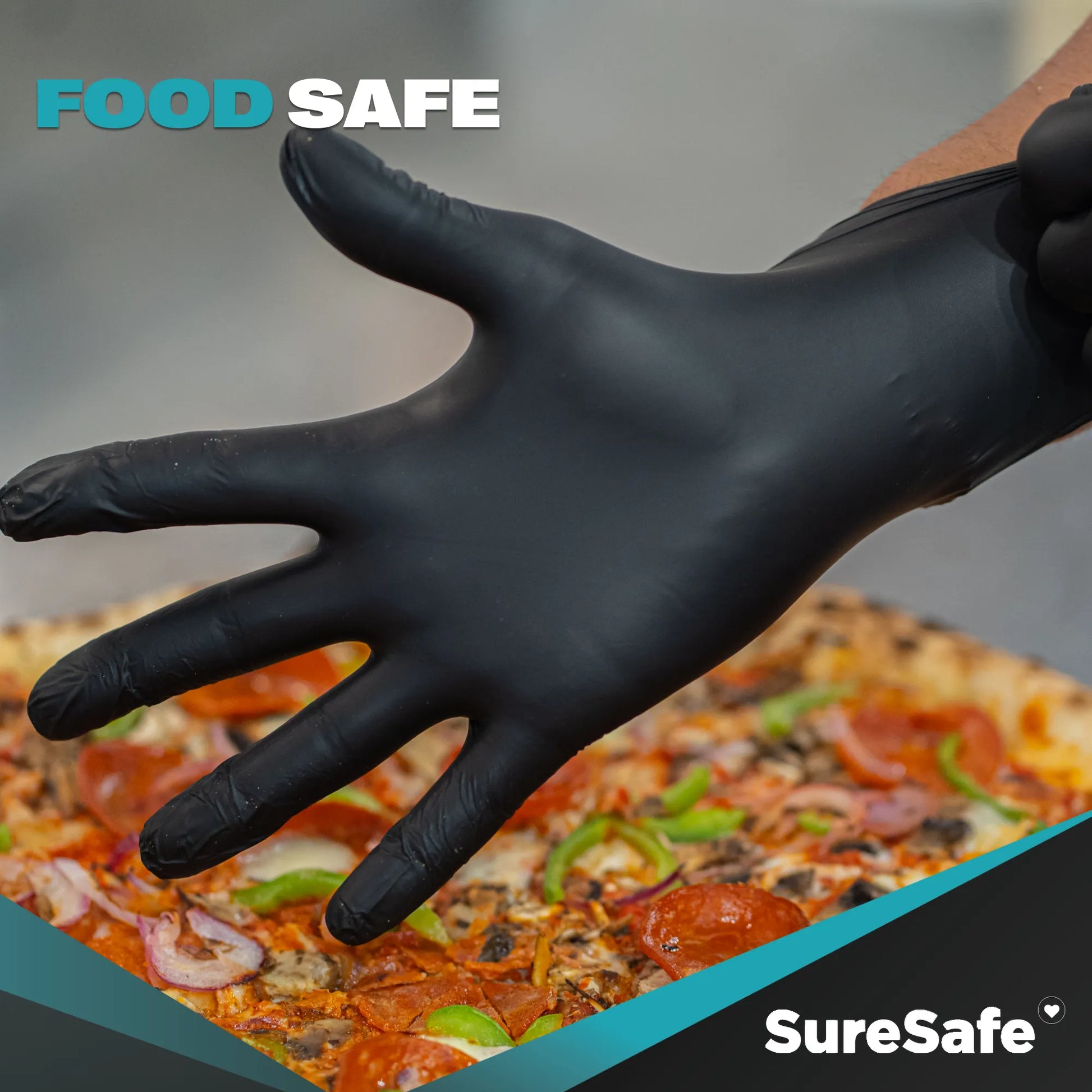 SureSafe Hybrid Blend black gloves being used for professional pizza preparation to show food-safe compliance.