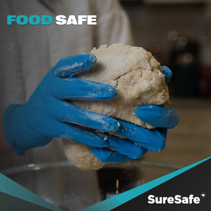Person wearing blue SureSafe GLACIER nitrile gloves while handling dough to show food-safe compliance.