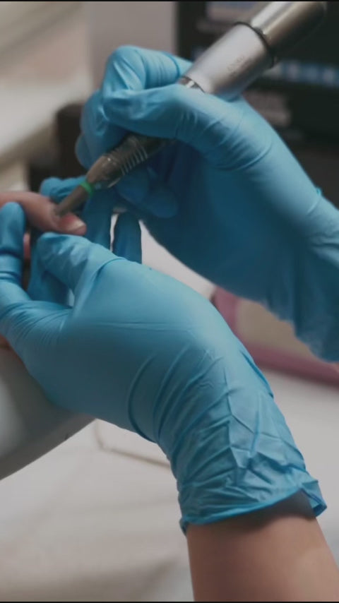 SureSafe professional blue and black nitrile gloves: high-dexterity protection for salons and commercial kitchens.