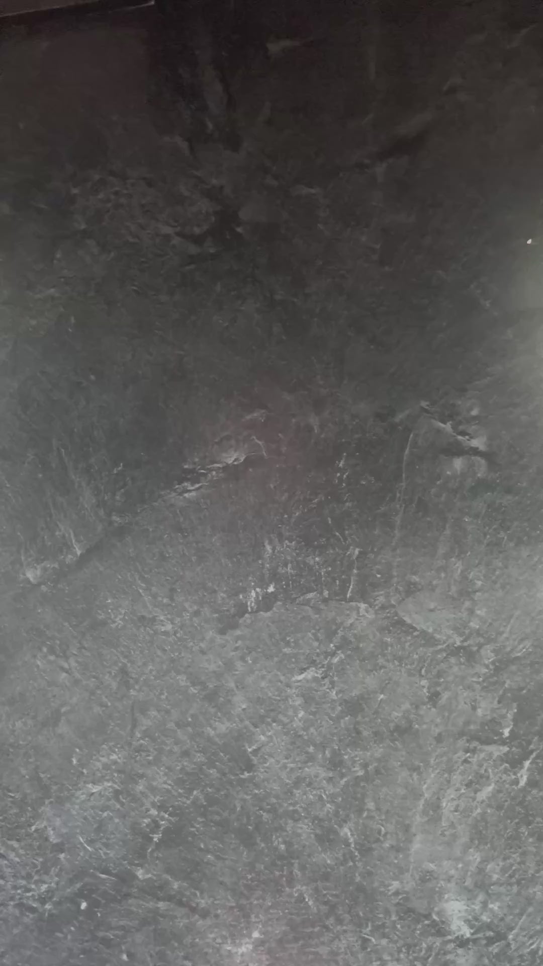 Using SureSafe Glacier Black nitrile gloves for household cleaning and bathroom maintenance for hand protection.