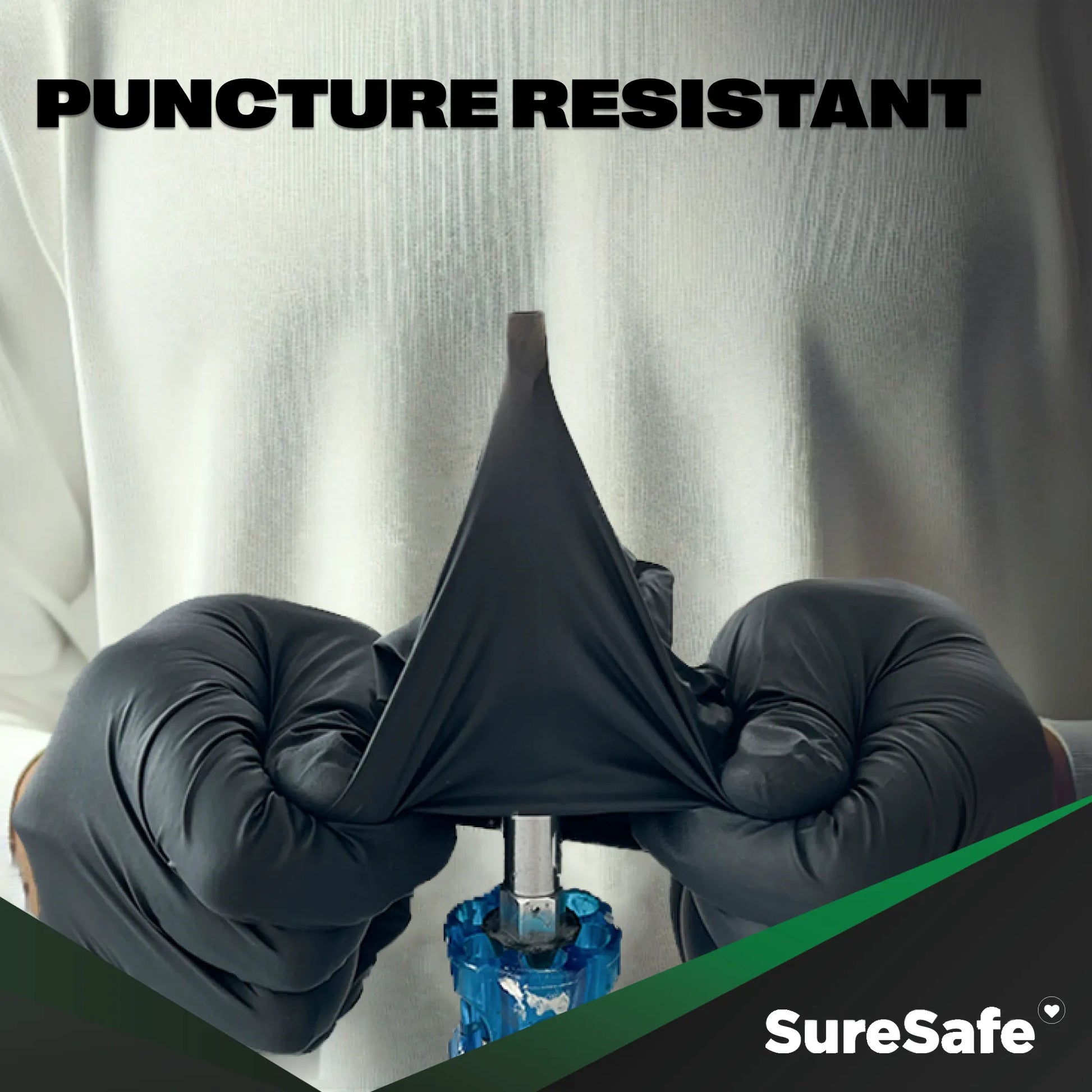 SureSafe OBS 5 mil black nitrile gloves being tested for puncture resistance to ensure safety in industrial environments.