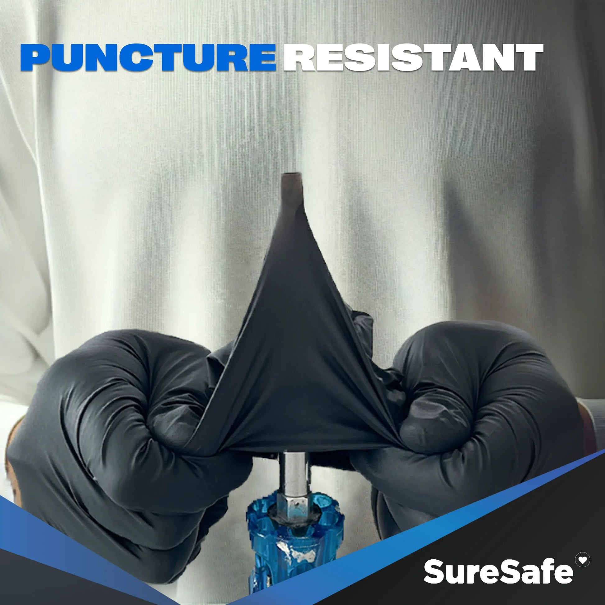 SureSafe OBS6 6 mil black nitrile gloves being tested against a screwdriver to show high puncture and abrasion resistance.
